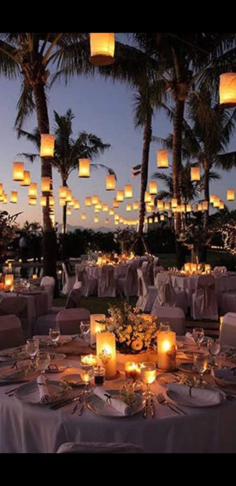 Lantern-lit outdoor dining setup